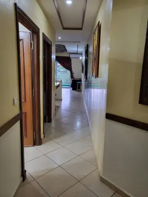 a hallway of a house with a tile floor at Votre havre de paix à Ifrane in Ifrane