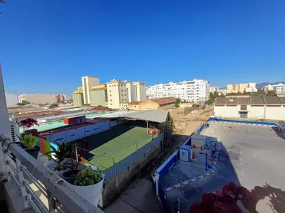 a tennis court on a tennis court at Belle vacances dans mon App in Meknès