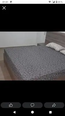 a picture of a bed in a room at Ikamat nakhil in Oulad Akkou