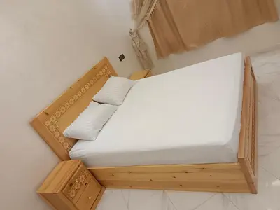 an overhead view of a bed in a room at Hay nahda dakhla in Oulad Akkou