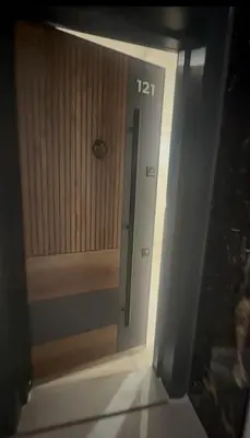 a door to a room with the number on it at شقة مريحه in Oulad Akkou