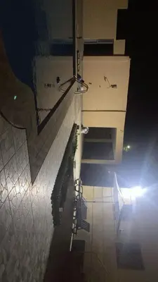 a view of a staircase in a building at night at Villa avec piscine-Meknès in Oulad Akkou