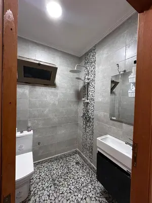a bathroom with a sink and a toilet at Villa Adam in Meknès