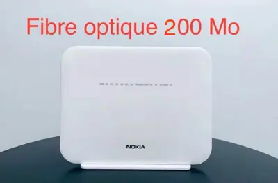 a rendering of a fibreoptic router on a table at Reda's Apparts centre ville wifi 200 Mo in Fès