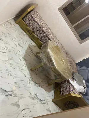 a room with a marble floor with a machine at Al basatine in Meknès