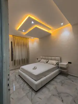 a bedroom with a large bed in a room at Appartment in hearth of new Fes in Fès