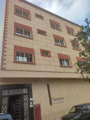 a building with a bunch of windows on it at The good stay 3 in Midelt