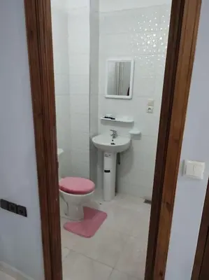 a bathroom with a toilet and a sink at Thé good stay4 midelt in Midelt